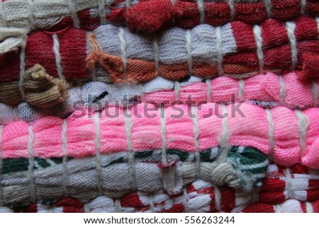 Macro view of a color woven rag rug.