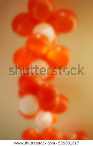 balloon red and white decoration on warn light blur