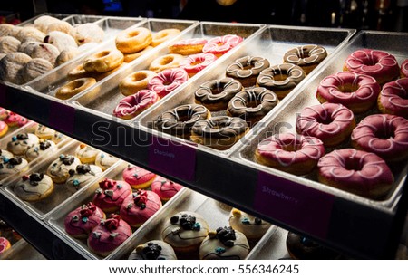 Picture of assorted donuts in tray.