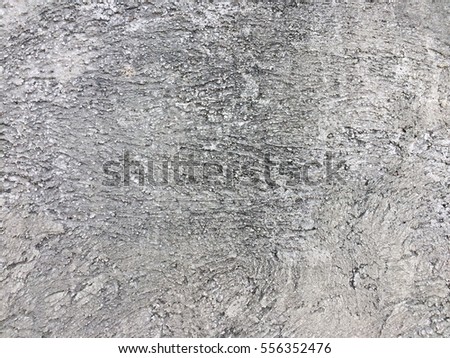 Dirty dark rough cement wall background texture