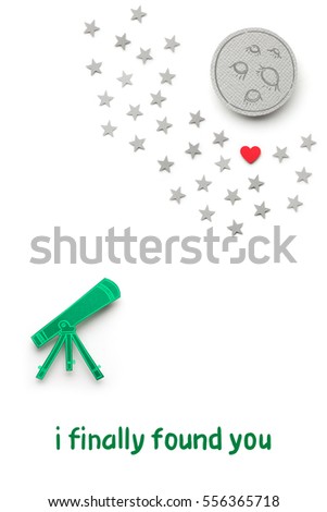 Creative valentines concept photo of a telescope made of paper with stars and heart on white background.