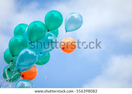 blurry balloon on sky Royalty-Free Stock Photo #556398082