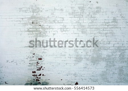 White Rustic Brick Texture. Retro Whitewashed Old Brick Wall Surface.  Royalty-Free Stock Photo #556414573