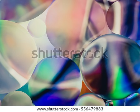 Oil drops in water. Abstract psychedelic pattern. Abstract background with colorful gradient colors.