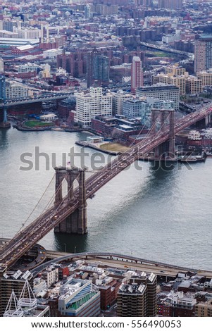 Brooklyn bridge photographed from manhattan from the freedom tower looking towards brooklyn on a cloudy day