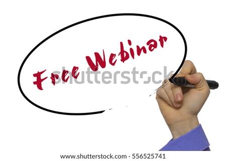 Woman Hand Writing Free Webinar on blank transparent board with a marker isolated over white background. Business concept. Stock Photo