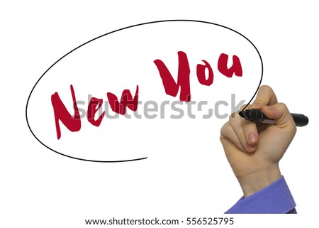 Woman Hand Writing New You on blank transparent board with a marker isolated over white background. Business concept. Stock Photo