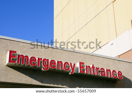 Sign: The word "Emergency Entrance" on hospital building