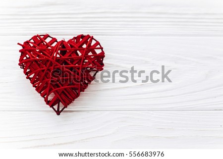 stylish red heart  flat lay on white wooden background. happy valentines day concept. greeting card with space for text. wedding or birthday  accessories 