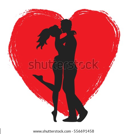 Kissing couple of young lowers and heart Royalty-Free Stock Photo #556691458