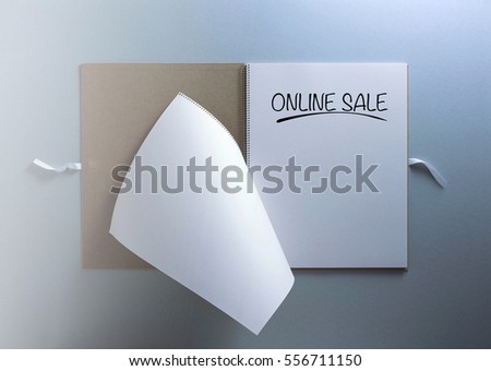 ONLINE SALE word on a notepad