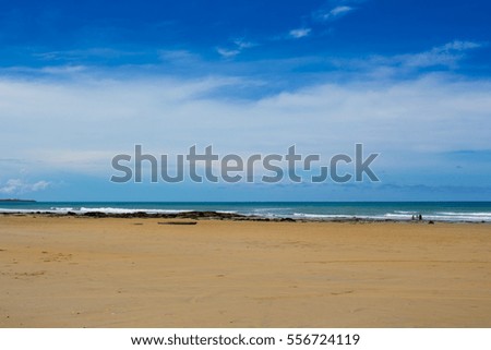 Beautiful  scenic view of famous  Cable Beach, Broome Western Australia,  a 22 kilometre long stretch of white sand, set against red ochre cliffs and fringed by turquoise waters of the Indian Ocean.
