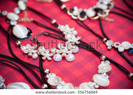Close up luxury necklace with gems and pearls