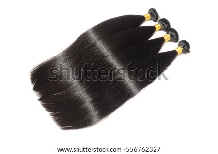 Silky straight natural black human hair extensions bundles Royalty-Free Stock Photo #556762327