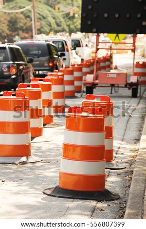 traffic cones by the side of street