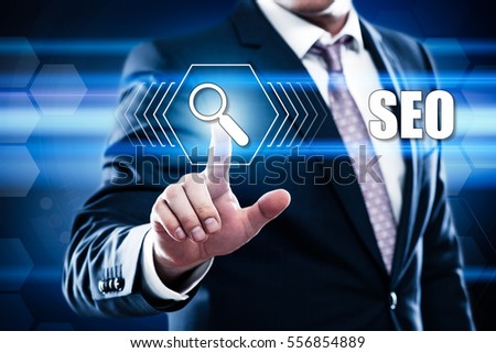 Business, technology, internet concept on hexagons and transparent honeycomb background. Businessman  pressing button on touch screen interface and select  seo