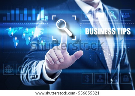 Business, technology, internet concept on hexagons and transparent honeycomb background. Businessman  pressing button on touch screen interface and select  business tips