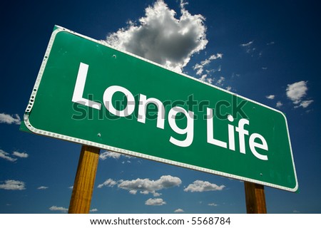 "Long Life" Road Sign with dramatic clouds and sky.