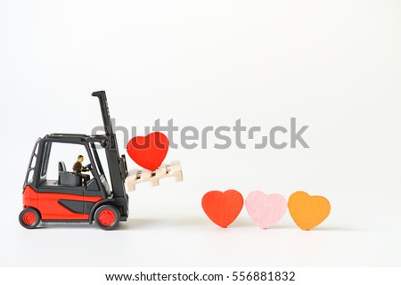 Love Concept of Red Heart Sign loading / carry on Forklift Truck, Lovely Heart, A Perfect Gift or Present for Someone Special, Valentines Day background 