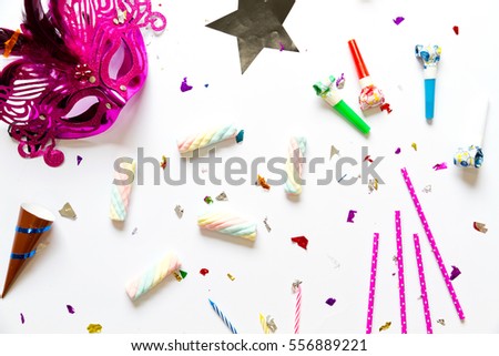 Purple mask, marshmallow, straw and whistle party isolate by white background