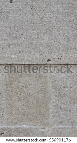 Grey concrete texture useful as a background - vertical