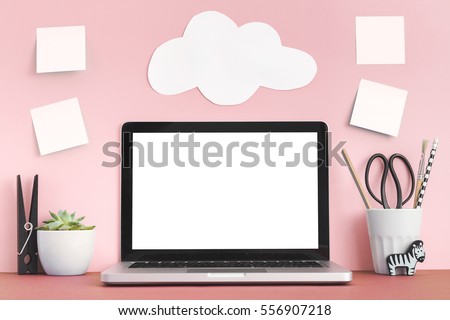 Mock up laptop, notebook on young student desk. Pink pastel colors. Royalty-Free Stock Photo #556907218
