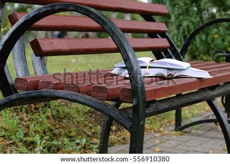 books on a bench in the school year