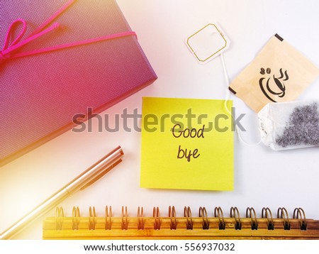 Top view of sticky note writing a THANK YOU, surrounding with a pen, gift, notepad, sachet. Concept Business