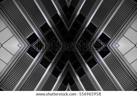 Ceiling or industrial or office building with ventilation grilles / grids. Grunge abstract black and white image on the subject of modern architecture / interior.