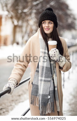 woman walking street coat face