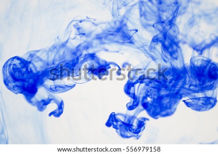 Abstract background blue ink dissolved in water
