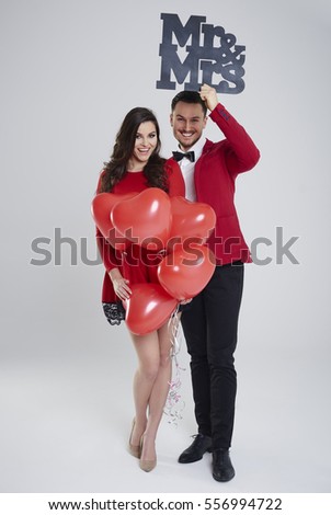 Adorable couple with valentines accessories