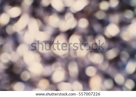 Blurred abstract background of white bokeh