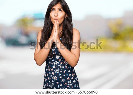 latin woman praying