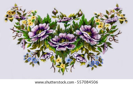 embroidered blue and purple flowers. Ukrainian hand embroidery. Fragment of folk ornament. Poppies and cornflowers. Very beautiful hand embroidery. Design of modern author's stylish modern clothing.