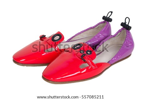 Female Red flat ballet shoes isolated on white