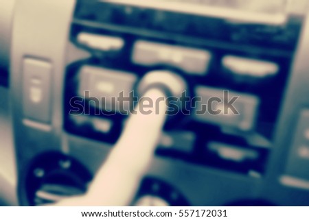 Blurred abstract background and can be illustration to article of Adjust the car radio