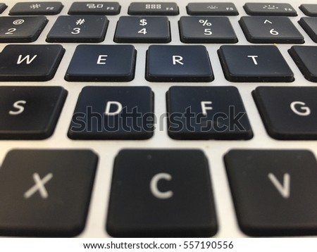 Keyboard of a laptop Royalty-Free Stock Photo #557190556