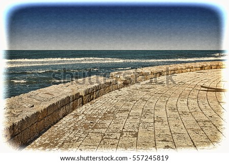 Promenade along the Mediterranean Sea in Akko. Embankment and city beach of old arabic city Akko, located north of Israel. Vintage style toned picture 