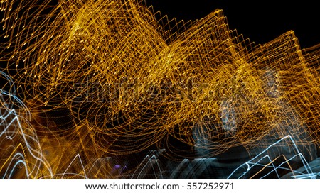 Beautiful Abstract futuristic painting color texture with lighting effect. Modern dynamic shiny pattern. Fractal graphic artwork design. Creative long exposure photography. Abstract lights at night.
