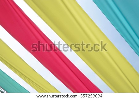 Colorful flags blowing against the blue sky, decoration for kids day or children day event