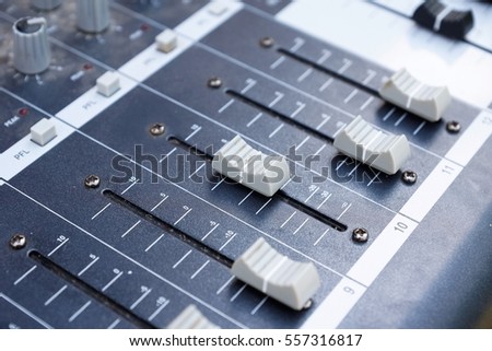 Background of old dusty audio mixing console 