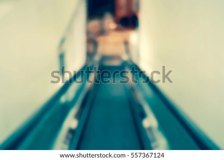 Picture blurred  for background abstract and can be illustration to article of people on escalator