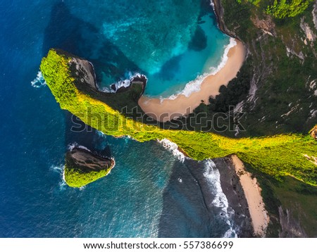 Aerial shot of the tropical coast of the island of Nusa Penida, beach of Kelingking, Indonesia
