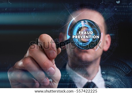 Business, Technology, Internet and network concept. Young businessman working on a virtual screen of the future and sees the inscription: fraud prevention 