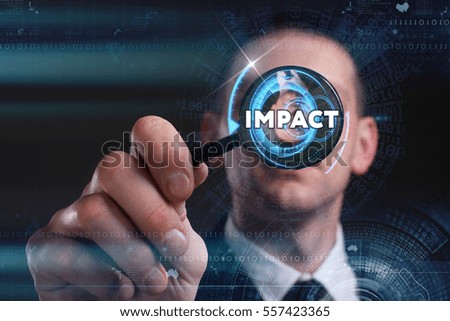 Business, Technology, Internet and network concept. Young businessman working on a virtual screen of the future and sees the inscription: impact 