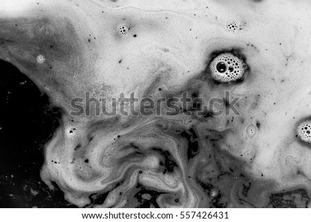 abstract background of  black ink dissolving in water