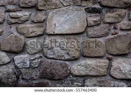 Old stone wall of an ancient Romanian Monastery, real history, perfect for backgrounds.