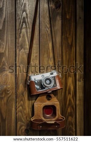 Old camera  on wooden table