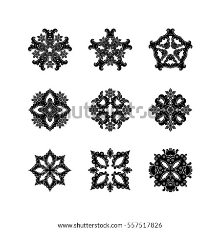 Set of ornate vector mandala symbols. Mehndi lace tattoo. Oriental weave. The circular pattern.